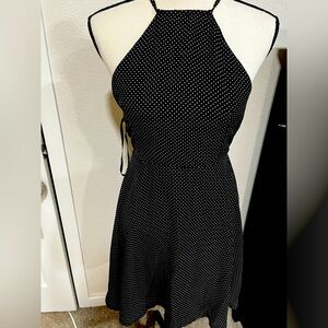 Backless black dress with white polka dots dress